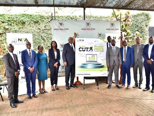 Hon. Chris Baryomunsi (Minister of ICT & NG) , Dr. Hatwib Mugasa and  NITA-U EXCO members at media after <br/>the launch of internet price reduction.